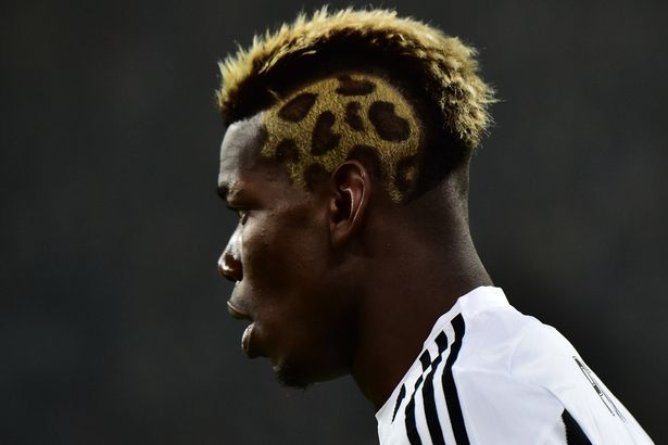Paul-Pogba-looks-on-during-the-Juventus-vs-AS-Roma-match-on-January-24-2016